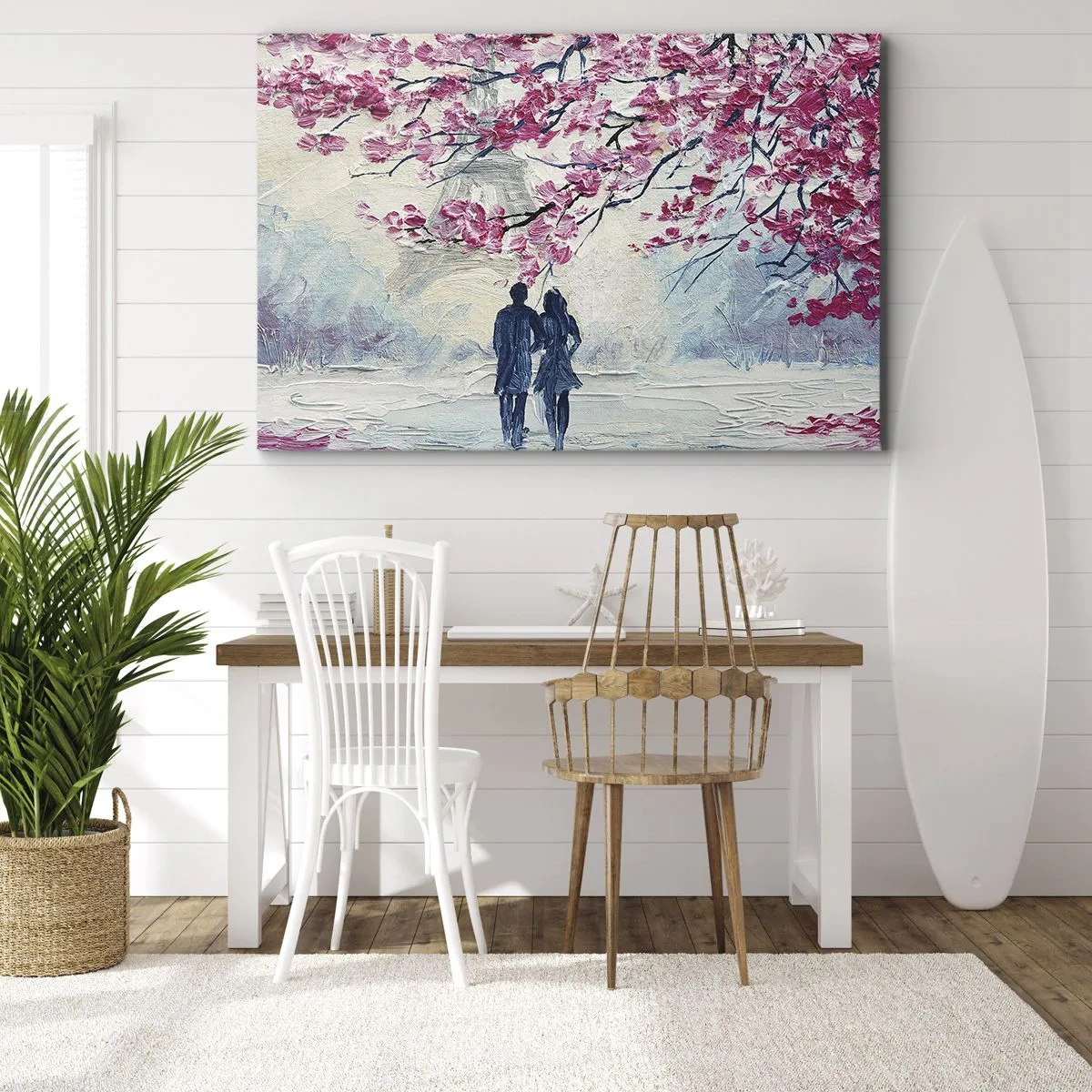 Vászonkép - Egy pár virágzó rózsaszín fák alatt, romantikus környezetben - 70x50cm - Romantikus séta - Modern fali dekoráció nappalihoz és hálószobához ARTTOR