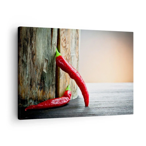 Vászonkép - Két piros chili paprika rusztikus díszítéssel, fából készült háttéren - 70x50cm - Red hot chili peppers - Modern fali dekoráció nappalihoz és hálószobához ARTTOR