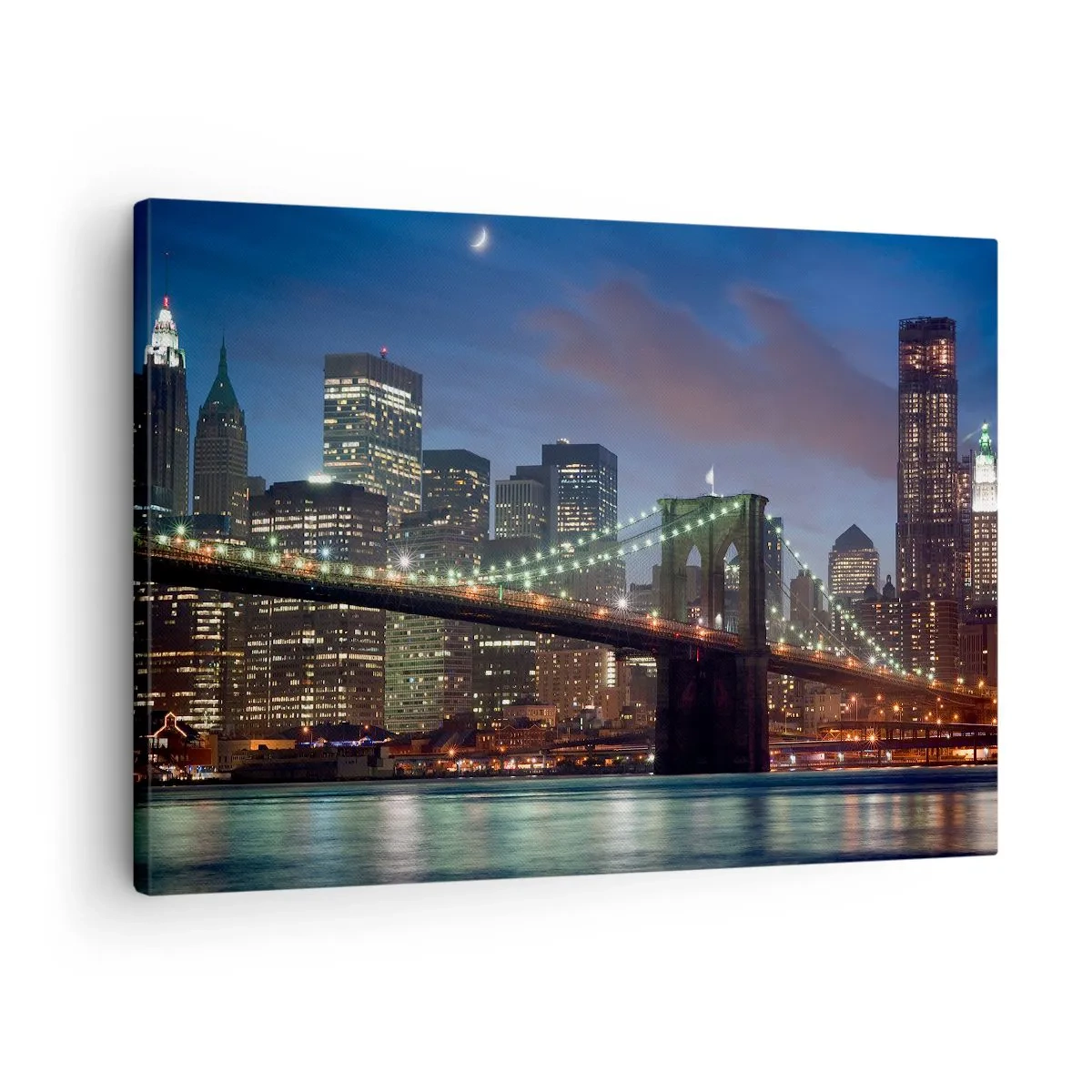 Vászonkép - New York City híd éjszaka kivilágított épületekkel - 70x50cm - Ragyogó éjszaka - Modern fali dekoráció nappalihoz és hálószobához ARTTOR
