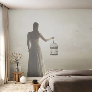 Fotótapéta Standard Eco - Egy nő egy ketrecben a távolba néz az ég és a tenger ellen. - 100x70cm - Légy szabad - Modern fali dekoráció nappalihoz és hálószobához ARTTOR