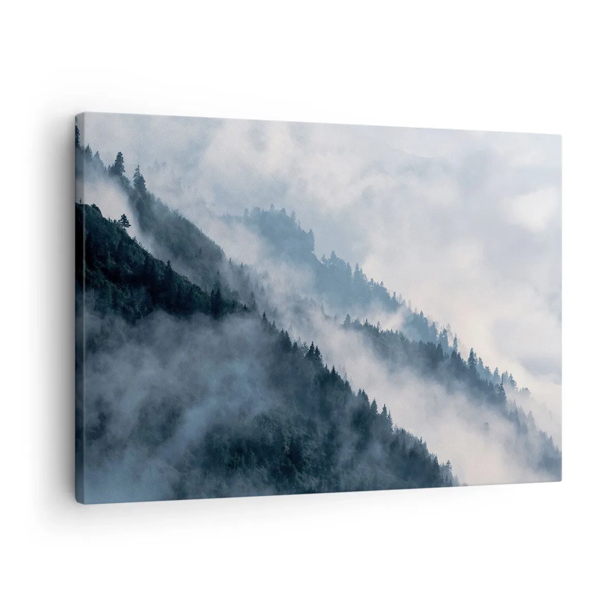 Vászonkép - Köd lebeg az erdős hegyoldalak felett egy titokzatos tájban - 70x50cm - A hegyek misztikája - Modern fali dekoráció nappalihoz és hálószobához ARTTOR