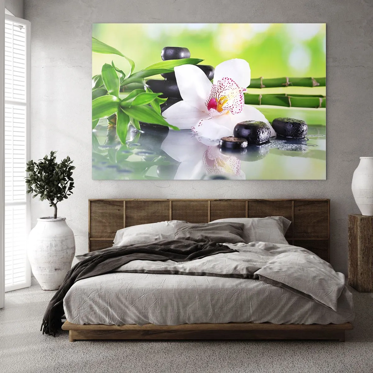 Üveg kép - Orchidea, bambusz és fekete kövek zöld háttér előtt - 70x50cm - Hűvös frissesség - Modern fali dekoráció nappalihoz és hálószobához ARTTOR