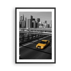 Poszter fehér keretben - Egy sárga taxi fekete-fehér városi háttér előtt - 50x70cm - Nagy város színei - Modern fali dekoráció nappalihoz és hálószobához ARTTOR