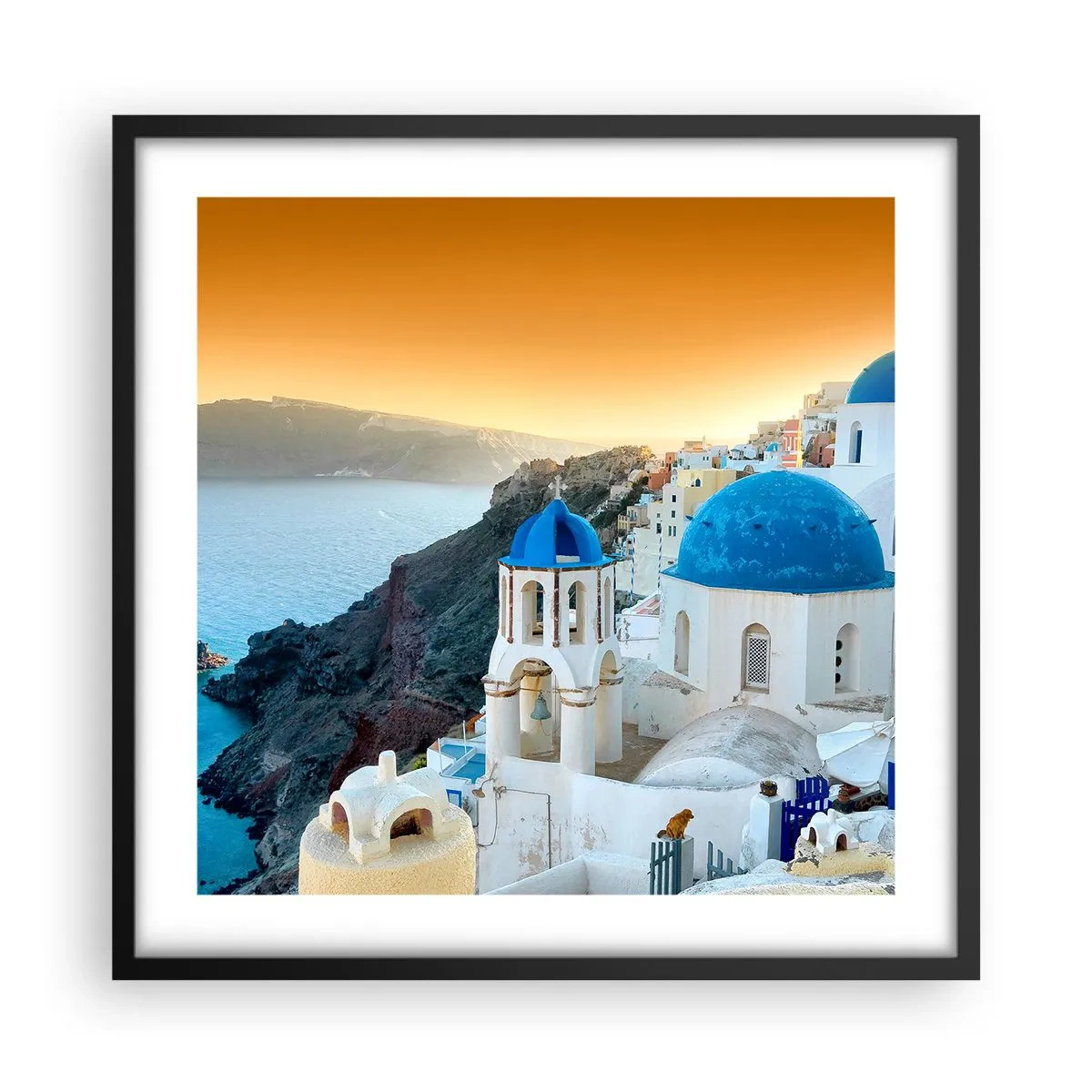 Poszter fehér keretben - Santorini – rásimulva a sziklákra - 50x50 cm