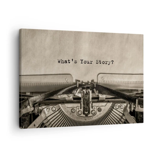 Vászonkép - Egy írógép, amelyen a „Mi a történeted?” felirat olvasható. - 70x50cm - Meséld el - Modern fali dekoráció nappalihoz és hálószobához ARTTOR