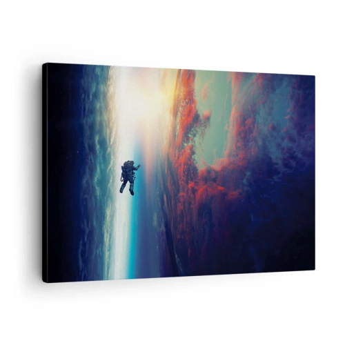 Vászonkép - Egy űrhajós lebeg az űrben egy színes Föld felett - 70x50cm - Szembenézés az univerzummal - Modern fali dekoráció nappalihoz és hálószobához ARTTOR