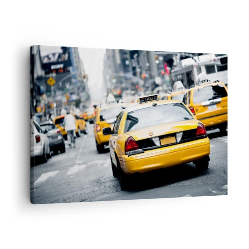 Vászonkép - Sárga taxik egy forgalmas városi utcán, a metropolisz központjában - 70x50cm - Csak ebben a városban - Modern fali dekoráció nappalihoz és hálószobához ARTTOR