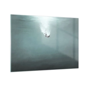 Üveg kép - Egy férfi sziluettje elmerül az óceán kék mélységében - 70x50cm - Az óceán ölelésében - Modern fali dekoráció nappalihoz és hálószobához ARTTOR