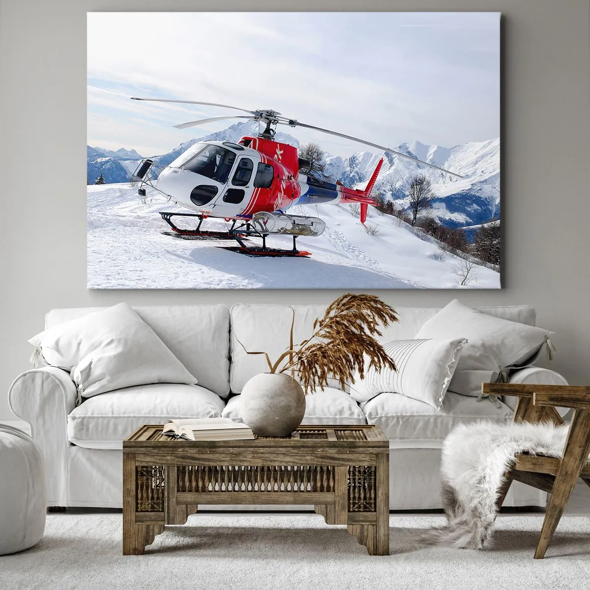 Vászonkép - Egy piros helikopter havas hegyi táj előtt. - 70x50cm - Mindig készen - Modern fali dekoráció nappalihoz és hálószobához ARTTOR