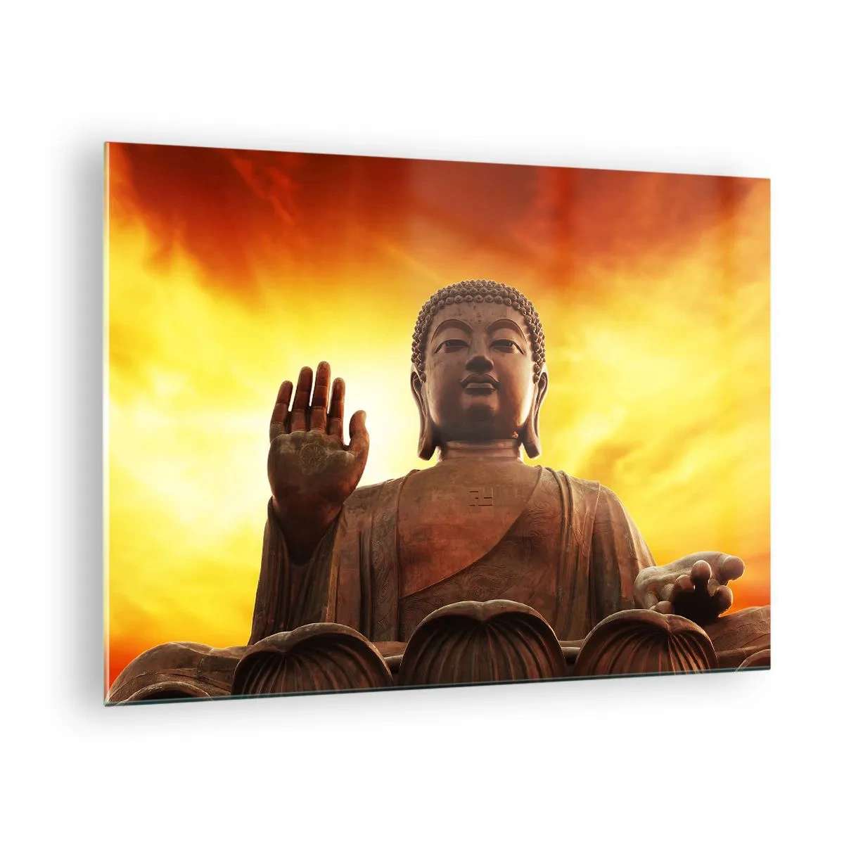 Üveg kép - Egy Buddha-szobor egy aranyló naplemente hátterében - 70x50cm - A világ békéje - Modern fali dekoráció nappalihoz és hálószobához ARTTOR