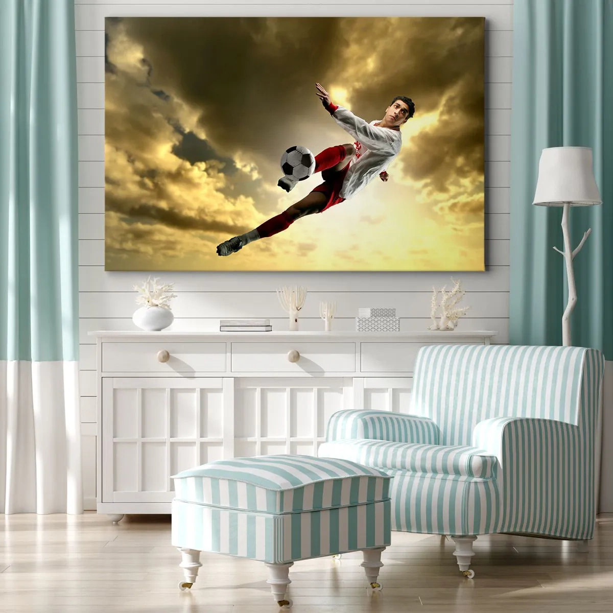 Vászonkép - Egy futballista dinamikus ugrásban rúgja a labdát az ég felé - 70x50cm - Futball Mennyország - Modern fali dekoráció nappalihoz és hálószobához ARTTOR