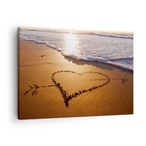 Vászonkép - Egy homokból készült szív a tengerparton naplementekor - 70x50cm - Nyári vallomás - Modern fali dekoráció nappalihoz és hálószobához ARTTOR