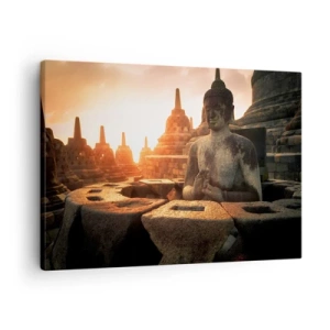 Vászonkép - Buddha-szobor a Borobudur templomban naplementekor - 70x50cm - A nagy bölcsesség időjárása - Modern fali dekoráció nappalihoz és hálószobához ARTTOR