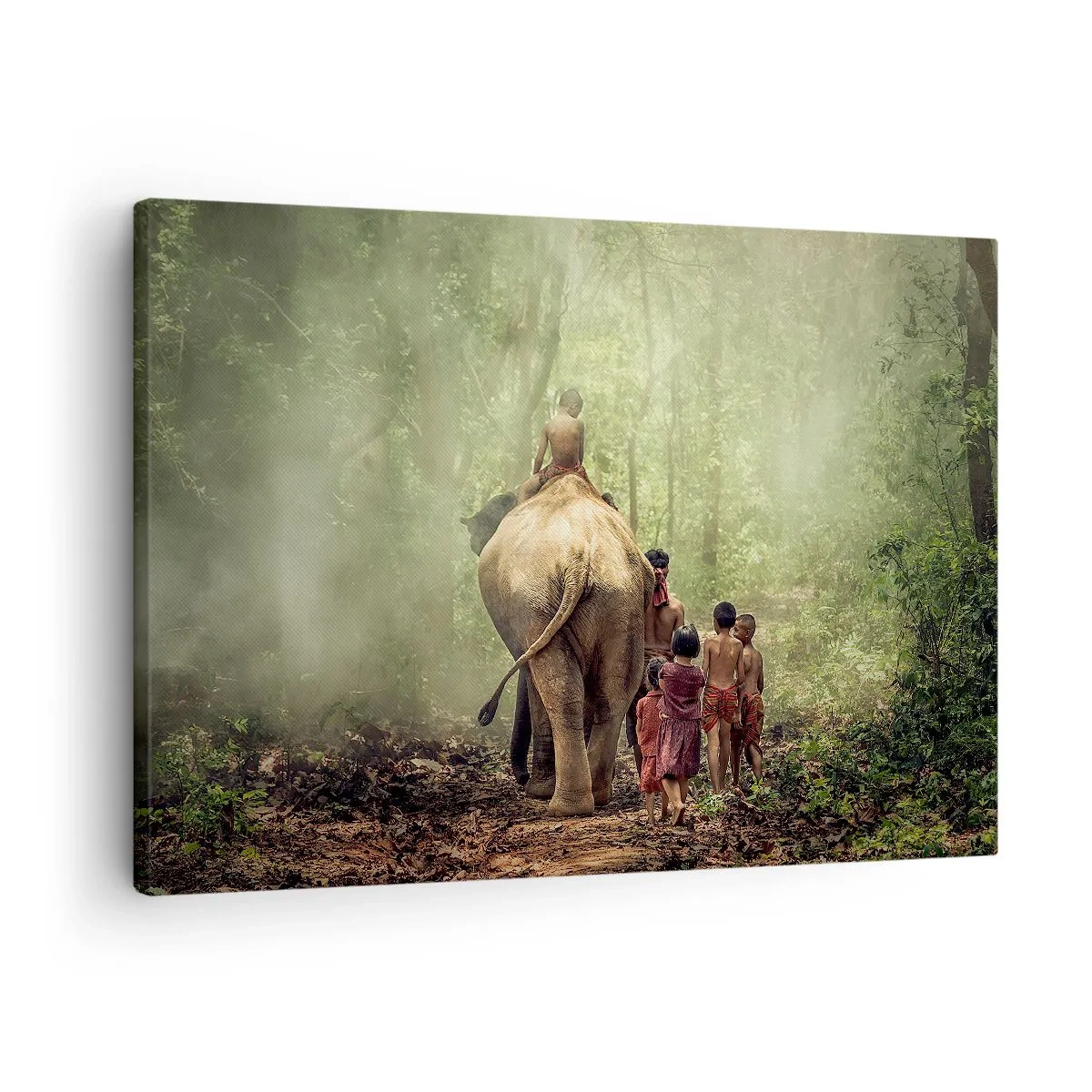 Vászonkép - Gyerekek egy elefánttal egy zöld erdőben a reggeli fényben - 70x50cm - Az új Dzsungel Könyve - Modern fali dekoráció nappalihoz és hálószobához ARTTOR