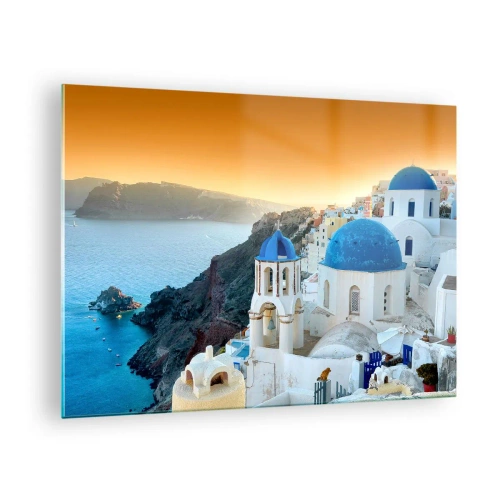 Üveg kép - Santorini látképe kék kupoláival és szikláival - 70x50cm - Santorini – rásimulva a sziklákra - Modern fali dekoráció nappalihoz és hálószobához ARTTOR