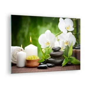 Üveg kép - Wellness-fürdő orchideákkal, kövekkel és gyertyákkal zöld háttér előtt - 70x50cm - Illatos, virágos, finom érintés - Modern fali dekoráció nappalihoz és hálószobához ARTTOR