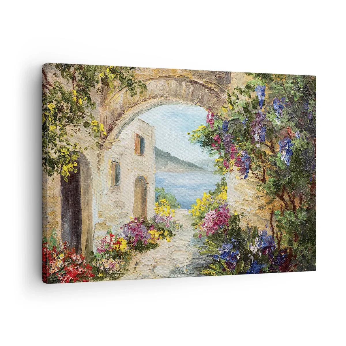 Vászonkép - Tengerparti táj kőépületekkel és virágokkal - 70x50cm - Egy tengerparti vidék varázsa - Modern fali dekoráció nappalihoz és hálószobához ARTTOR