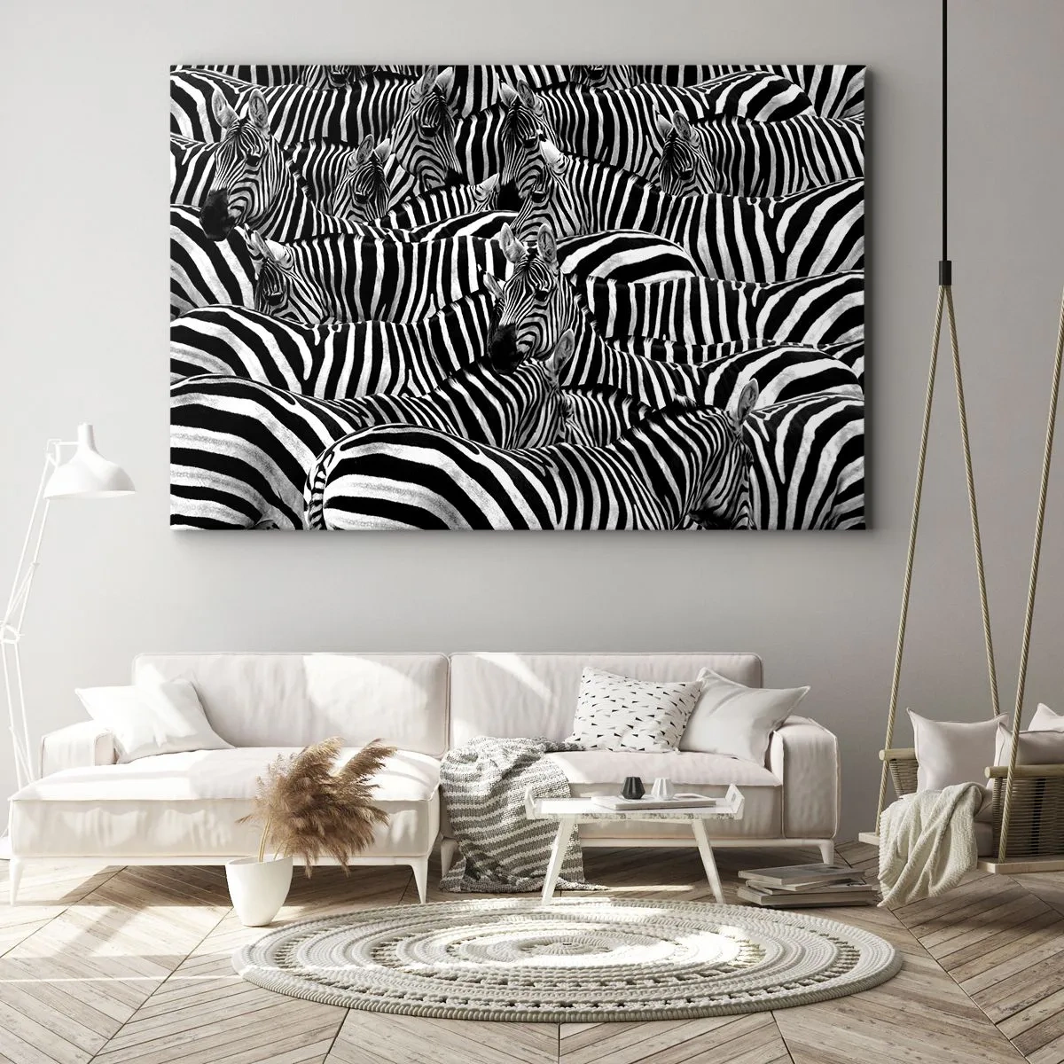 Vászonkép - Egy csoport zebrák fekete-fehér csíkokkal, amelyek szimmetrikus mintázatot hoznak létre. - 70x50cm - Csoportos, csíkos portré - Modern fali dekoráció nappalihoz és hálószobához ARTTOR