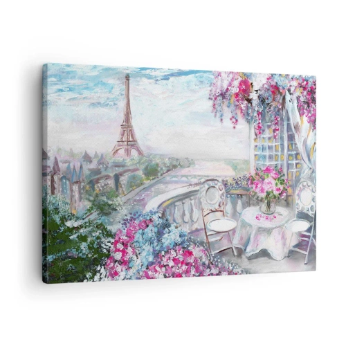 Vászonkép - Romantikus kilátás Párizsra az Eiffel-toronnyal és egy virágokkal teli erkéllyel - 70x50cm - Itt májusban a legszebb - Modern fali dekoráció nappalihoz és hálószobához ARTTOR