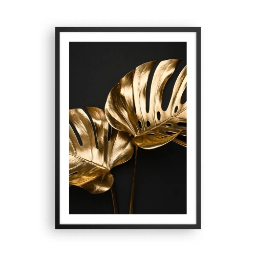 Poszter fehér keretben - Arany monstera levelek fekete háttéren, elegáns színkontraszt - 50x70cm - A természet kincsei - Modern fali dekoráció nappalihoz és hálószobához ARTTOR