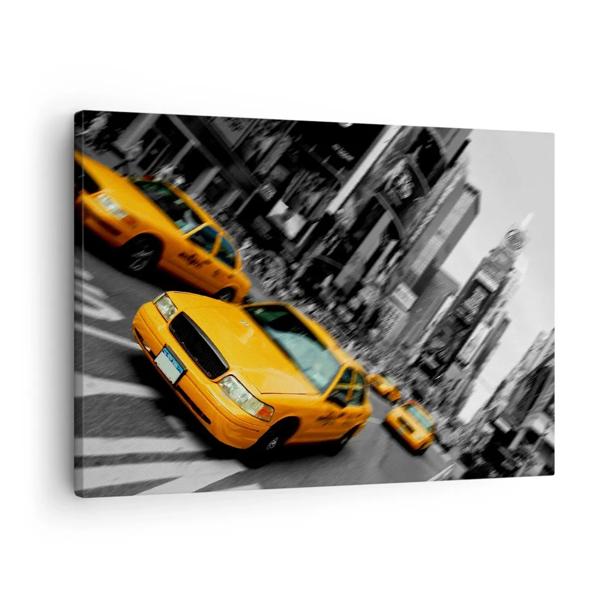 Vászonkép - Sárga taxik egy forgalmas városi kereszteződésben - 70x50cm - New York-i napfény cseppjei - Modern fali dekoráció nappalihoz és hálószobához ARTTOR