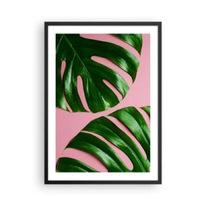 Poszter fehér keretben - Monstera levelek rózsaszín háttéren minimalista stílusban - 50x70cm - Zöld rendez-vous - Modern fali dekoráció nappalihoz és hálószobához ARTTOR