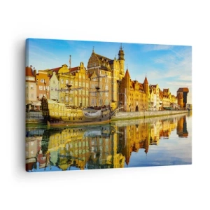 Vászonkép - Festői kilátás az óvárosra egy vitorláshajóval és vízzel - 70x50cm - A múlt tükörképe - Modern fali dekoráció nappalihoz és hálószobához ARTTOR