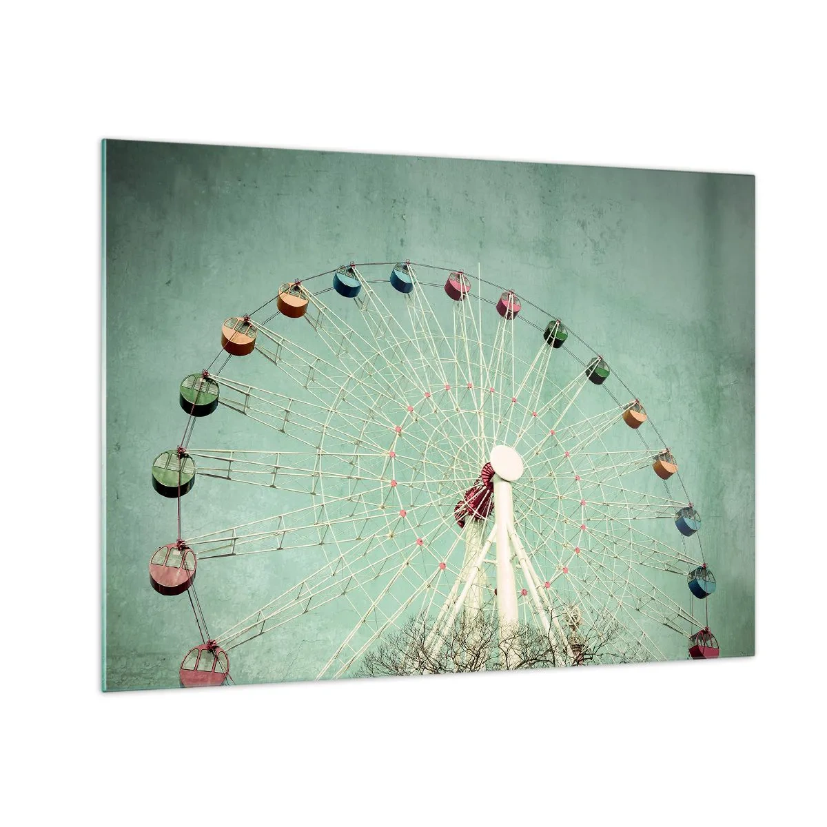 Üveg kép - Egy színes óriáskerék pasztellzöld háttér előtt - 70x50cm - Gyere játszani - Modern fali dekoráció nappalihoz és hálószobához ARTTOR
