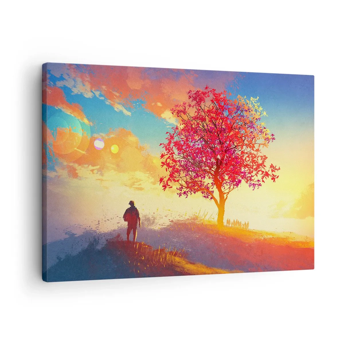 Vászonkép - Egy alak egy dombon, egy színes fa mellett, a lenyugvó nap fényében - 70x50cm - Zarándok a célállomáson - Modern fali dekoráció nappalihoz és hálószobához ARTTOR