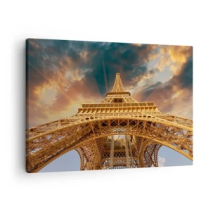 Vászonkép - Az Eiffel-torony alulról a lenyugvó nap hátterében - 70x50cm - Ahogy az emberiség eljutott az egekig - Modern fali dekoráció nappalihoz és hálószobához ARTTOR