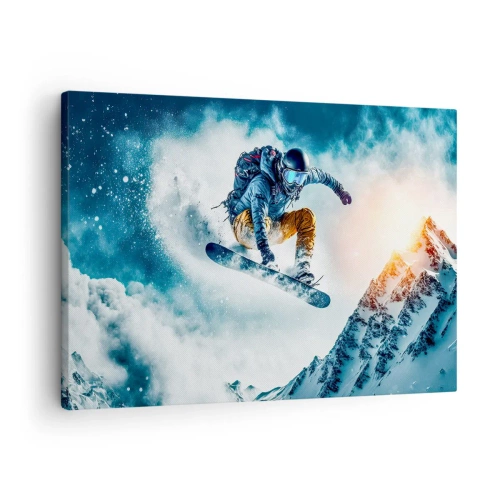 Vászonkép - Egy snowboardos repül a hófödte hegyek felett - 70x50cm - Extrém érzelmek - Modern fali dekoráció nappalihoz és hálószobához ARTTOR