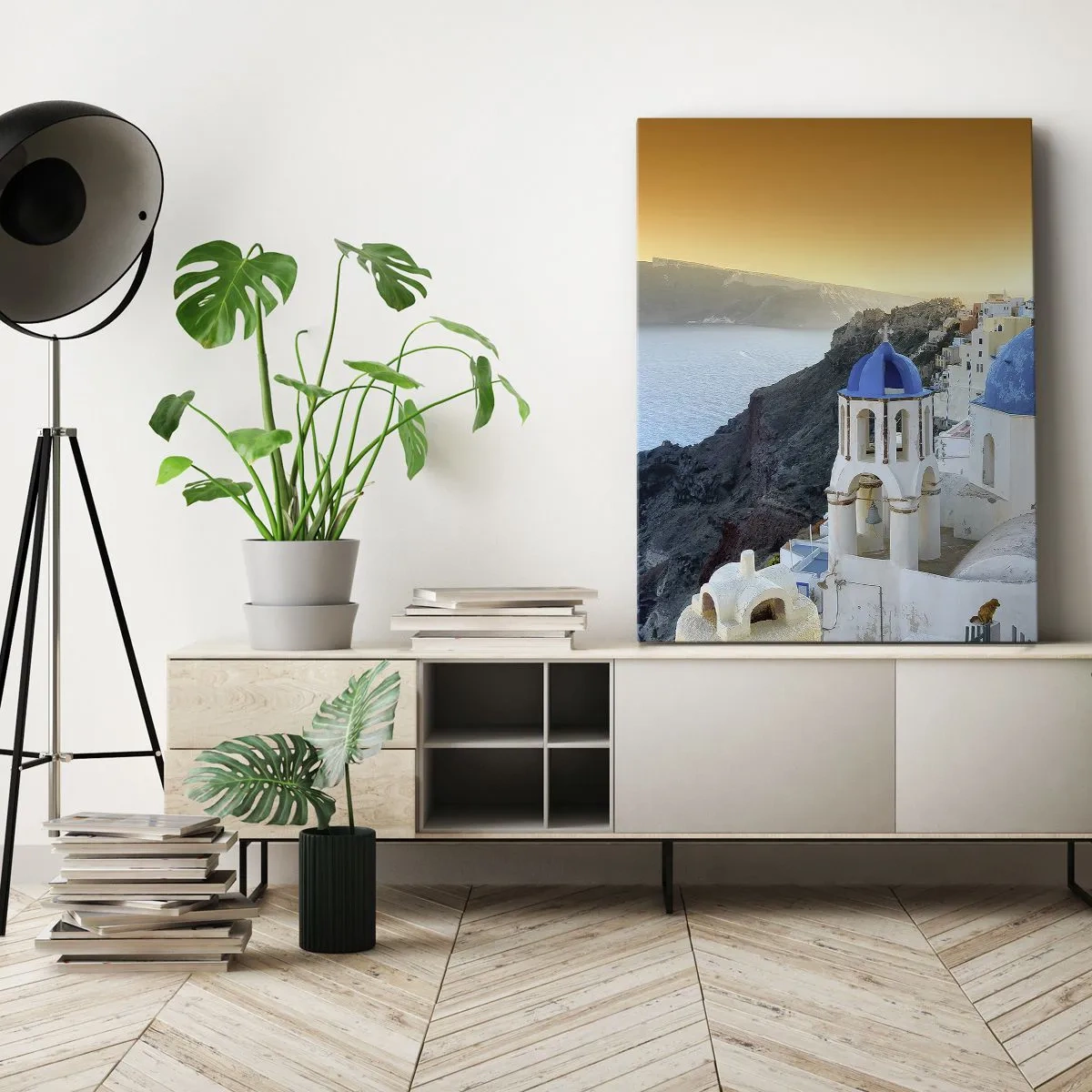 Vászonkép - Santorini – rásimulva a sziklákra - 50x70 cm