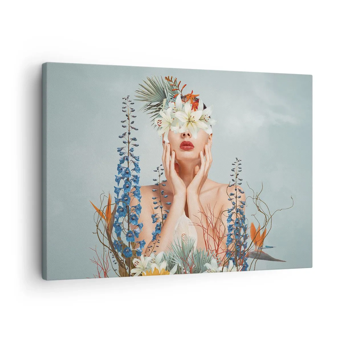 Vászonkép - Nő portréja virágmotívummal kék háttér előtt - 70x50cm - Virág-nő - Modern fali dekoráció nappalihoz és hálószobához ARTTOR