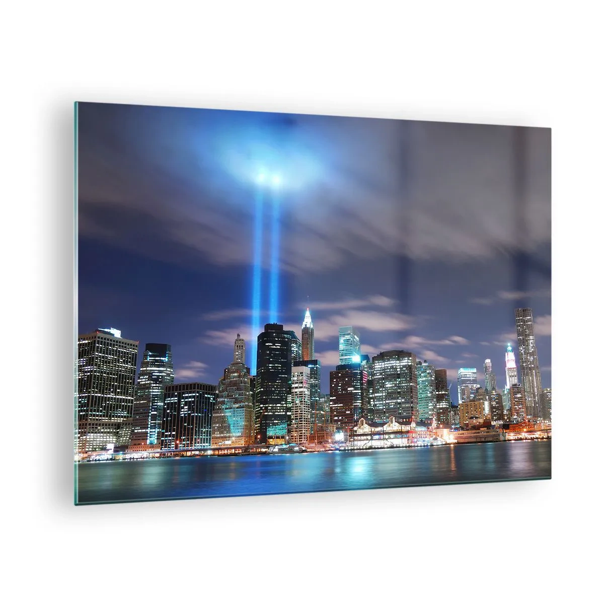 Üveg kép - Esti panoráma a városra reflektorokkal - 70x50cm - Érd el a fénnyel az eget - Modern fali dekoráció nappalihoz és hálószobához ARTTOR