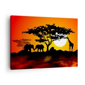 Vászonkép - Afrikai naplemente elefántok és zsiráfok sziluettjeivel a víz felett - 70x50cm - Találkozás a szavannán - Modern fali dekoráció nappalihoz és hálószobához ARTTOR
