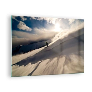 Üveg kép - Egy síelő siklik le egy lejtőn a téli nap fényében - 70x50cm - Hegyi kihívás teljesítve - Modern fali dekoráció nappalihoz és hálószobához ARTTOR