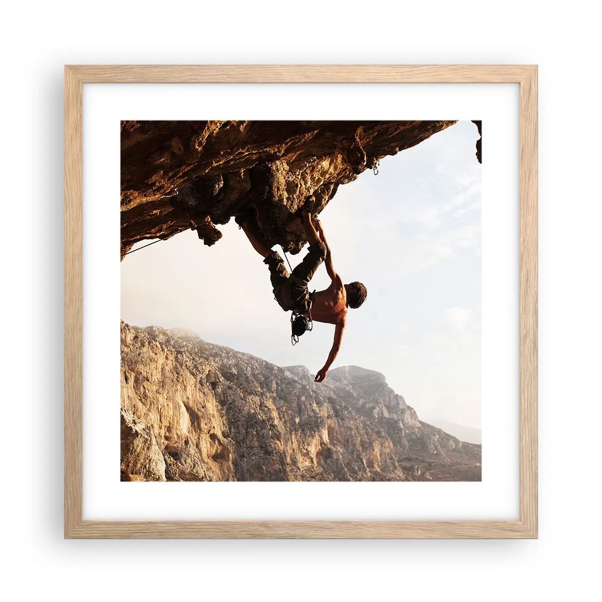 Poszter világos tölgy keretben - A világ egy szikladarabon összezsugorodott egy kézben - 40x40 cm