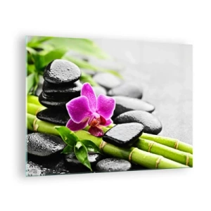 Üveg kép - Orchidea, fekete kövek és bambusz nyugodt kompozícióban - 70x50cm - Nyugodt egyensúlyban - Modern fali dekoráció nappalihoz és hálószobához ARTTOR