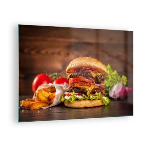Üveg kép - Lédús burger feltétekkel és sült krumplival, fából készült háttéren - 70x50cm - Tiltott gyümölcs - Modern fali dekoráció nappalihoz és hálószobához ARTTOR
