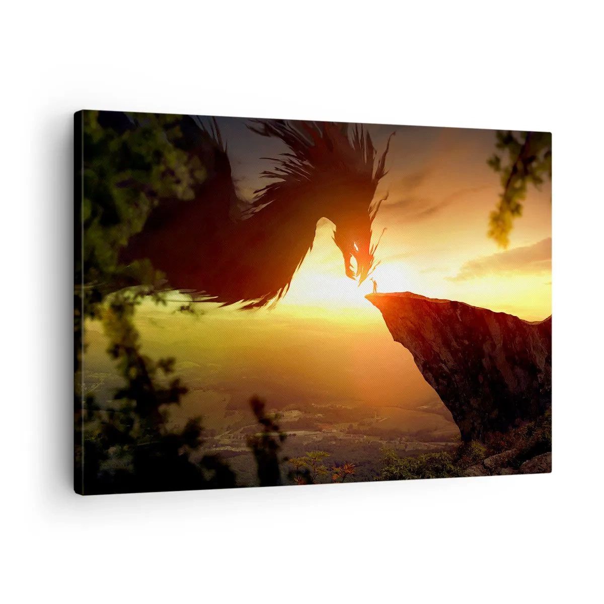 Vászonkép - Egy sárkány és egy férfi egy sziklán a lenyugvó nap fényében - 70x50cm - Sárkányölő - Modern fali dekoráció nappalihoz és hálószobához ARTTOR