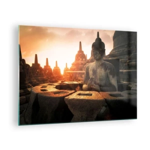 Üveg kép - Egy Buddha-szobor, amelyet a lenyugvó nap világít meg egy ősi templomkomplexumban - 70x50cm - A nagy bölcsesség időjárása - Modern fali dekoráció nappalihoz és hálószobához ARTTOR