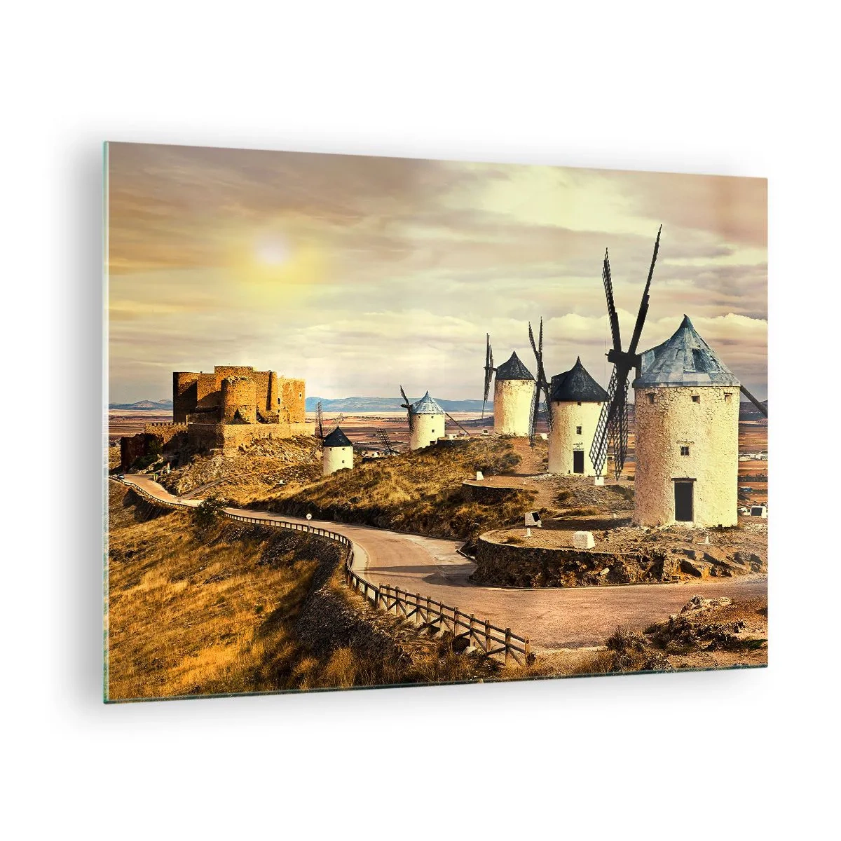 Üveg kép - Szélmalmok és egy kastély a tájban naplementekor - 70x50cm - Mindjárt megjelenik Don Quijote - Modern fali dekoráció nappalihoz és hálószobához ARTTOR