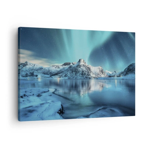 Vászonkép - Aurora Borealis hófödte hegyek és egy tó felett - 70x50cm - Fénynek az éjszakában - Modern fali dekoráció nappalihoz és hálószobához ARTTOR