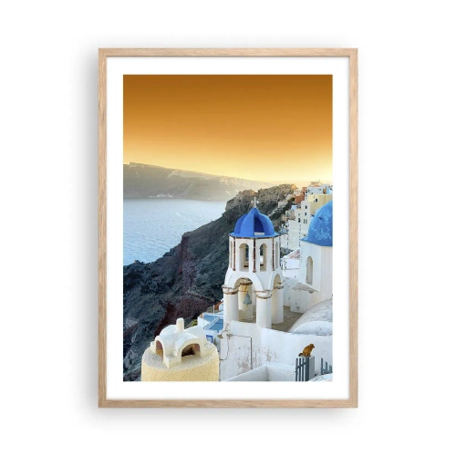 Poszter világos tölgy keretben - Santorini – rásimulva a sziklákra - 50x70 cm