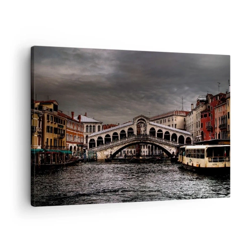 Vászonkép - Rialto híd Velencében a Canal Grandén át, klasszikus építészet. - 70x50cm - Egy velencei este ígérete - Modern fali dekoráció nappalihoz és hálószobához ARTTOR