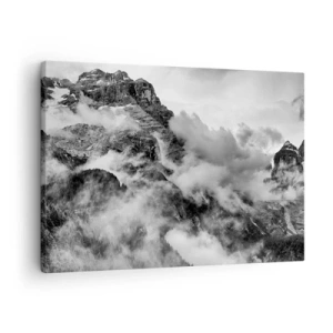 Vászonkép - Fekete-fehér kép a felhőkkel körülvett hegyekről - 70x50cm - Gyönyörű és kegyetlen - Modern fali dekoráció nappalihoz és hálószobához ARTTOR
