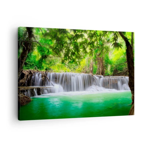 Vászonkép - Egy zöld vízesés, sűrű trópusi növényzettel körülvéve - 70x50cm - Zuhatag zöldben - Modern fali dekoráció nappalihoz és hálószobához ARTTOR