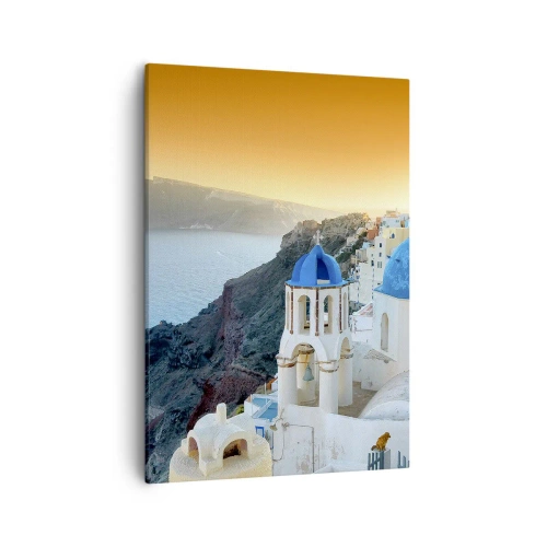 Vászonkép - Santorini – rásimulva a sziklákra - 50x70 cm