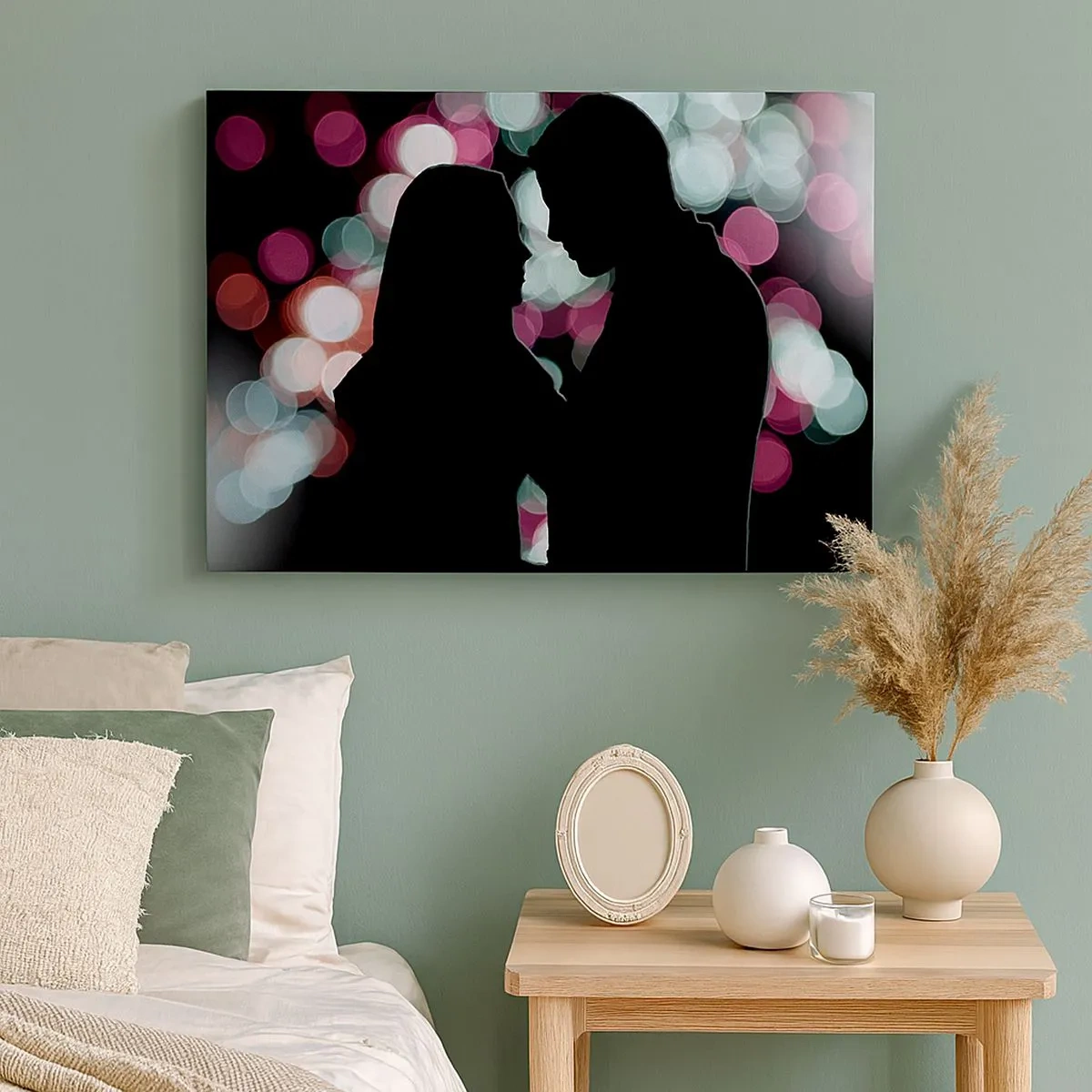 Vászonkép - Egy pár sziluettjei színes bokeh fények hátterében - 70x50cm - Igen! - Modern fali dekoráció nappalihoz és hálószobához ARTTOR