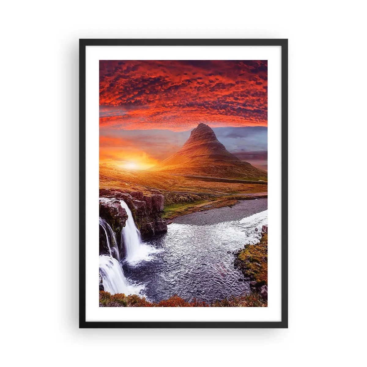 Poszter fehér keretben - A hegy és a vízesés, melyet a lenyugvó nap sugarai világítanak meg - 50x70cm - Középfölde kilátása - Modern fali dekoráció nappalihoz és hálószobához ARTTOR